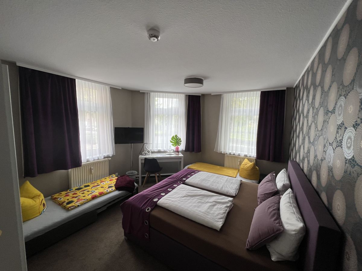 Family room with double bed and extra bed